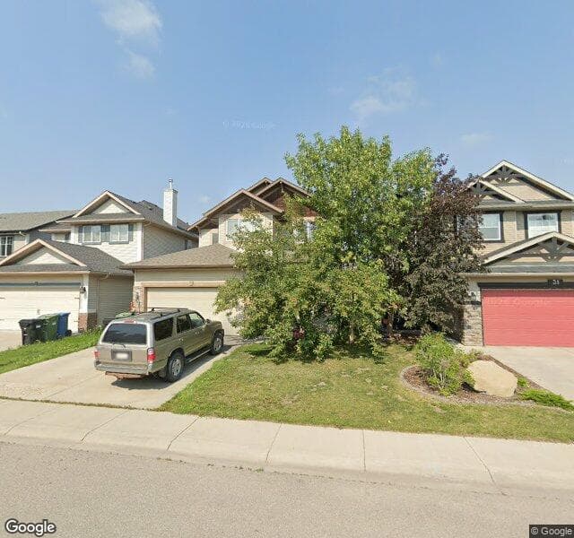 Street view of 35 Cougarstone Way SW, Calgary