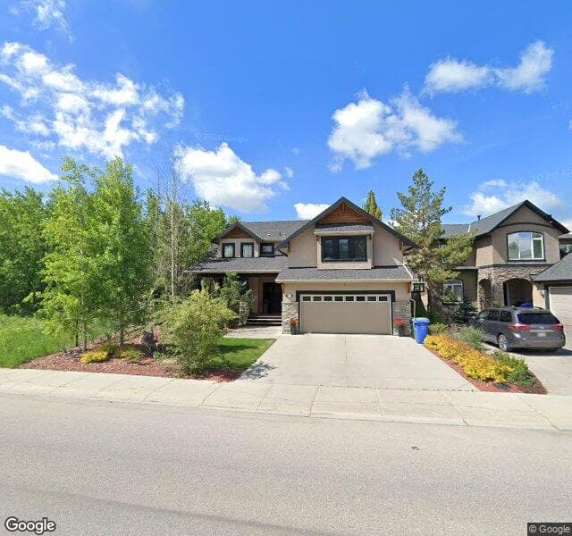 Street view of 655 Tuscany Springs Boulevard NW, Calgary