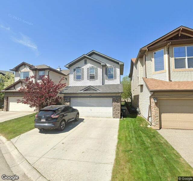Street view of 59 Cougarstone Landing SW, Calgary