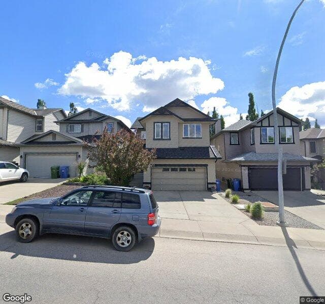 Street view of 715 Tuscany Drive NW, Calgary