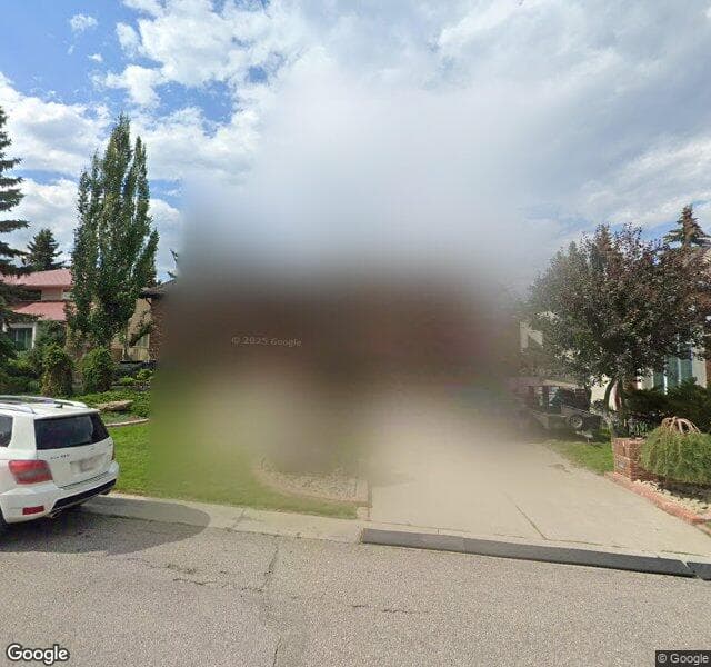 Street view of 581 Coach Grove Road SW, Calgary