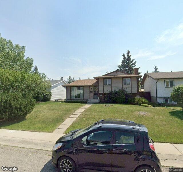 Street view of 132 Cedar Ridge Crescent SW, Calgary