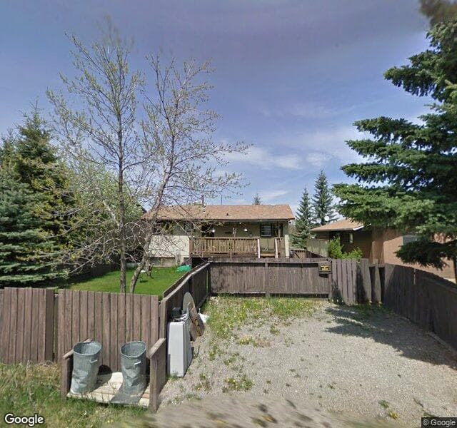 Street view of 1087 Pinecliff Drive NE, Calgary