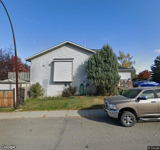 Street view of 59 Rivercroft Close SE, Calgary