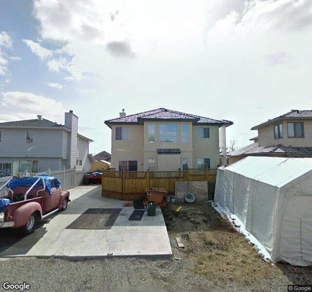 Street view of 10943 Harvest Lake Way NE, Calgary