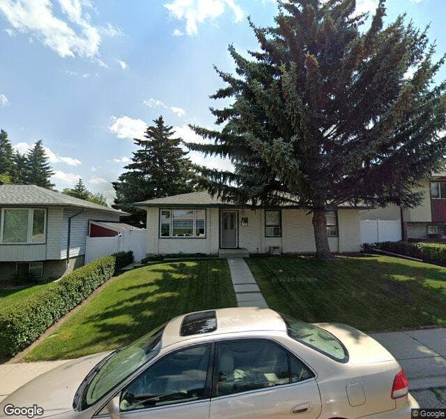 Street view of 727 Canfield Place SW, Calgary