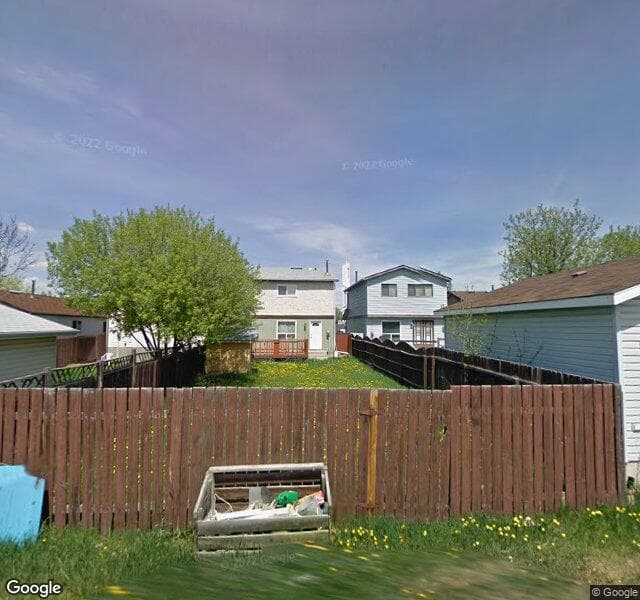 Street view of 222 Pinemeadow Road NE, Calgary