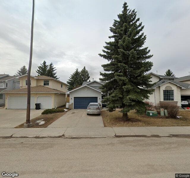 Street view of 98 Riverbend Drive SE, Calgary