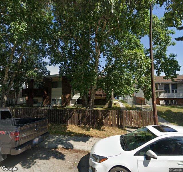 Street view of 108 Pinehill Place NE, Calgary