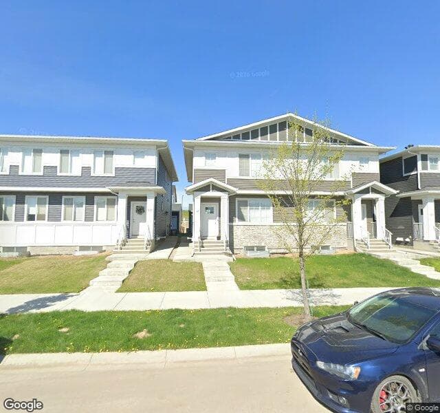 Street view of 56 Creekside Rise SW, Calgary