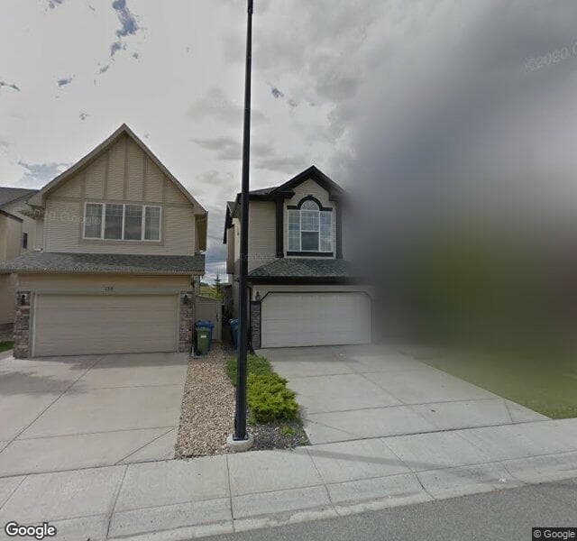 Street view of 140 Cougarstone Common SW, Calgary