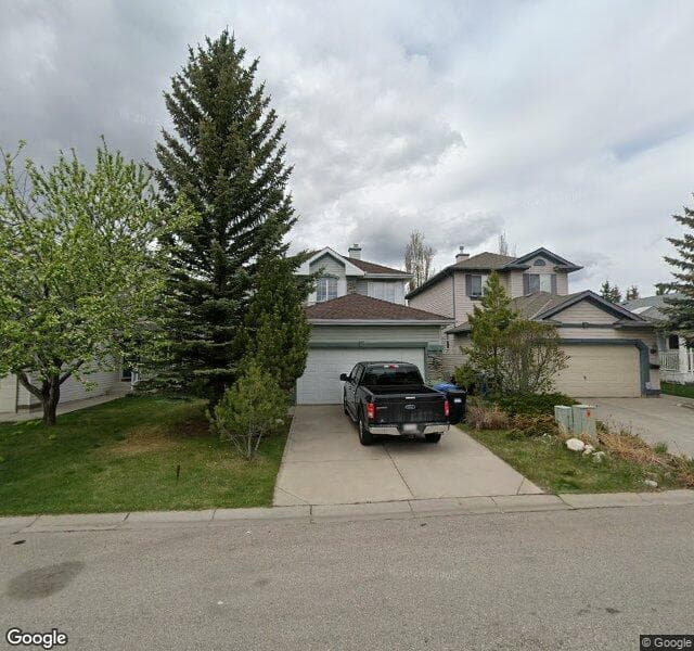Street view of 61 Rocky Ridge Circle NW, Calgary