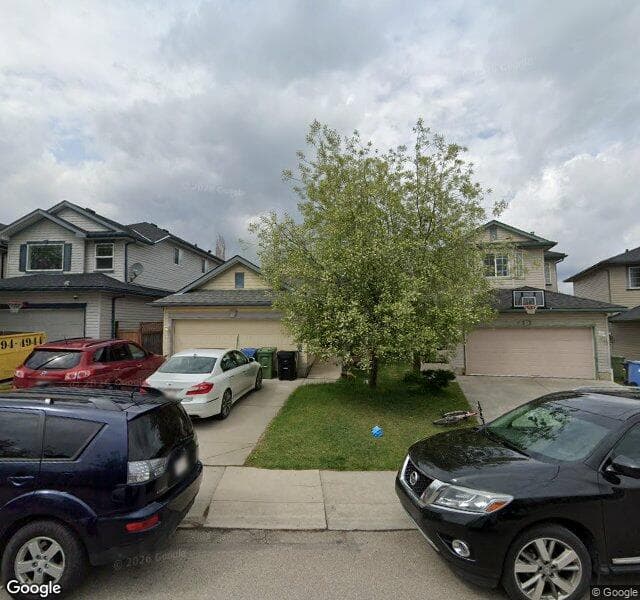 Street view of 1022 Bridlemeadows Manor SW, Calgary