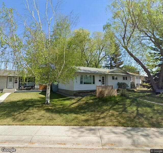 Street view of 1199 Lake Huron Crescent SE, Calgary
