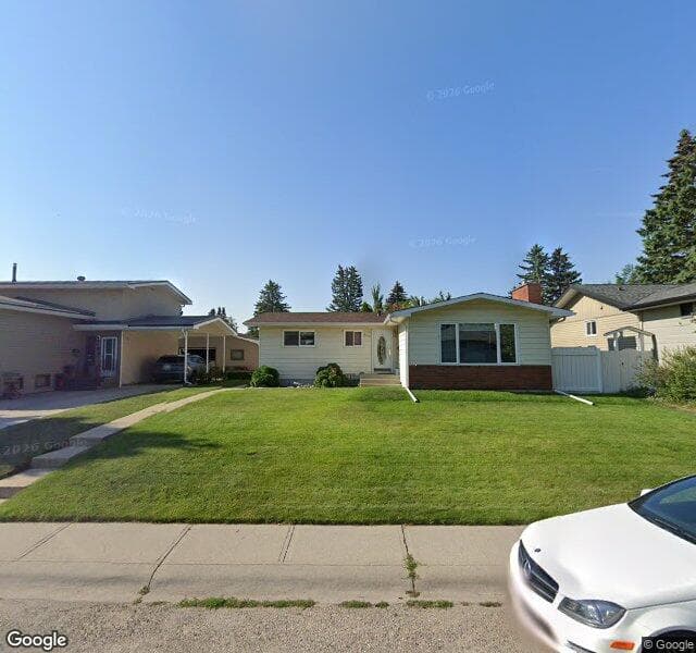 Street view of 104 Bralorne Crescent SW, Calgary