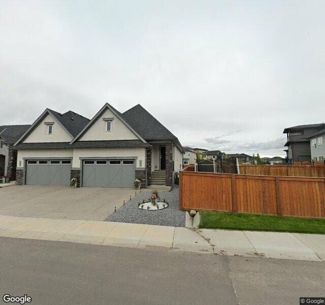 Street view of 25 Cranbrook Mews SE, Calgary