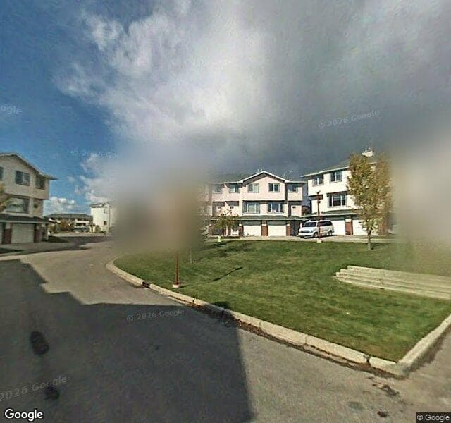 Street view of 153 Rocky Ridge Court NW, Calgary