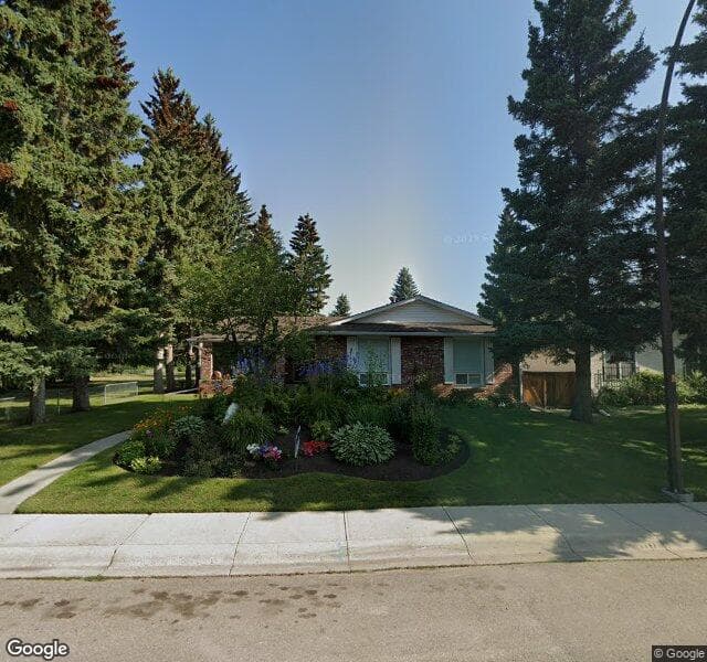 Street view of 9751 Oakhill Drive SW, Calgary