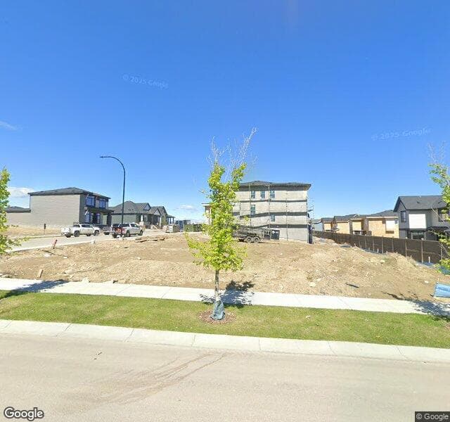 Street view of 82 Bluerock Avenue SW, Calgary