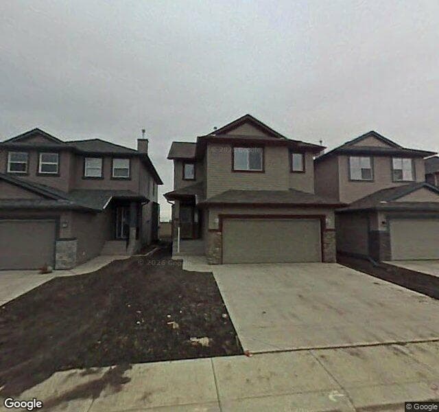Street view of 84 Saddlecrest Gardens NE, Calgary