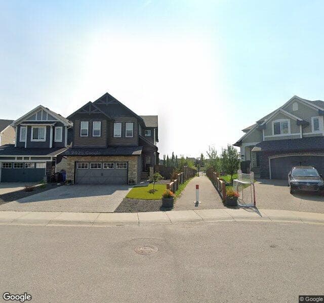 Street view of 41 Cougar Ridge Cove SW, Calgary