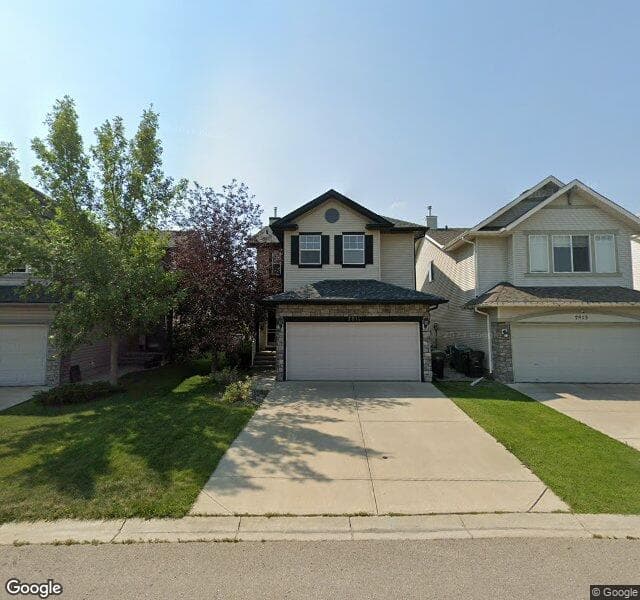 Street view of 7911 Cougar Ridge Avenue SW, Calgary