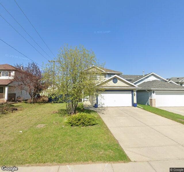 Street view of 87 Harvest Rose Gardens NE, Calgary