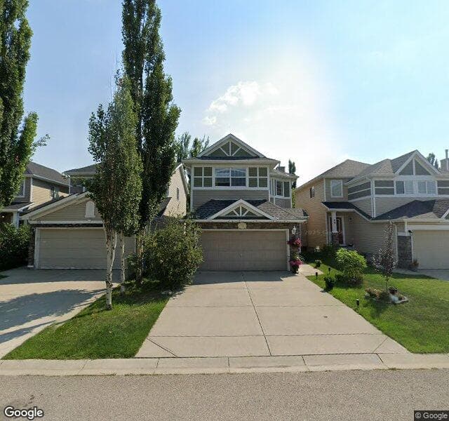 Street view of 62 Cougar Plateau Way SW, Calgary