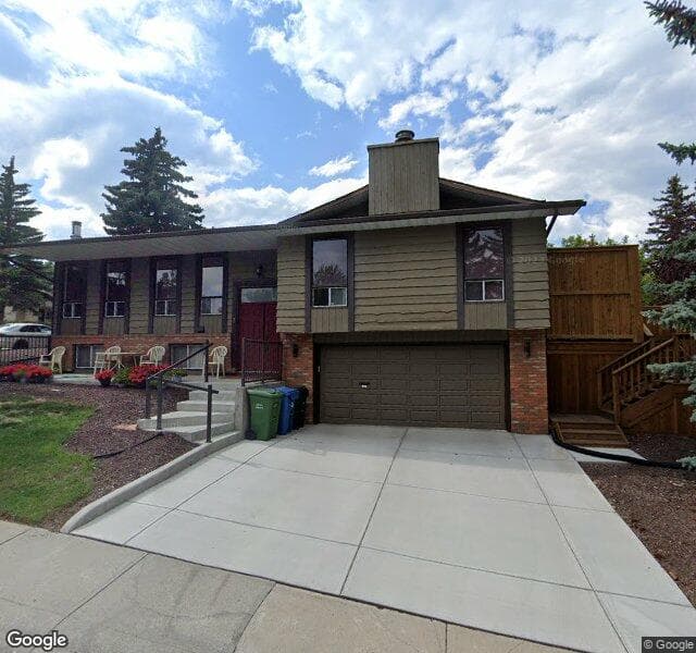 Street view of 1 Coach Manor Terrace SW, Calgary