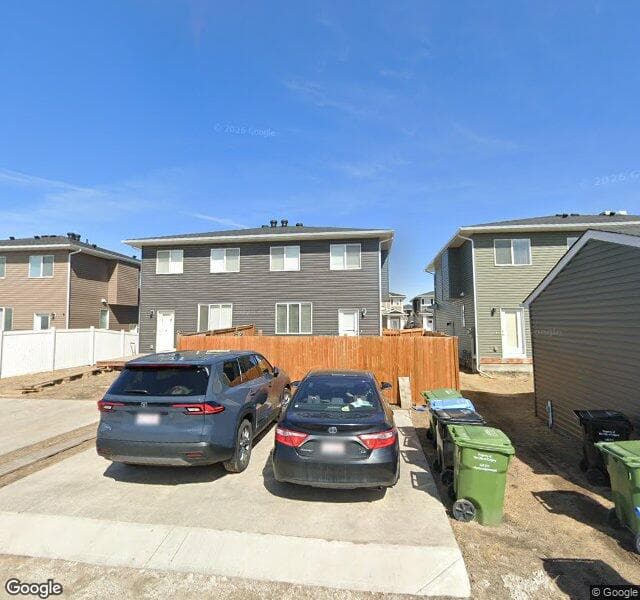 Street view of 116 Red Embers Place NE, Calgary