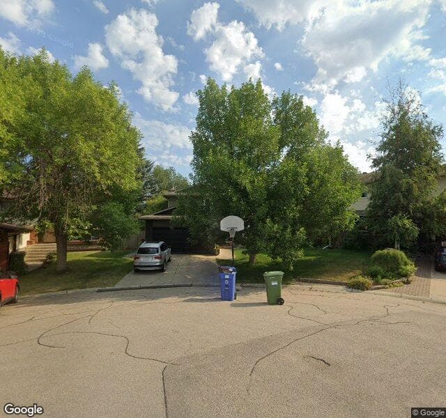 Street view of 147 Woodridge Place SW, Calgary
