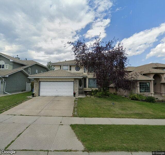 Street view of 32 Signature Way SW, Calgary