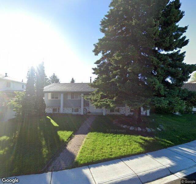 Street view of 11 Lake Geneva Place SE, Calgary