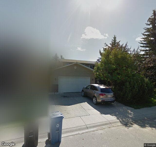 Street view of 23 Woodglen Circle SW, Calgary