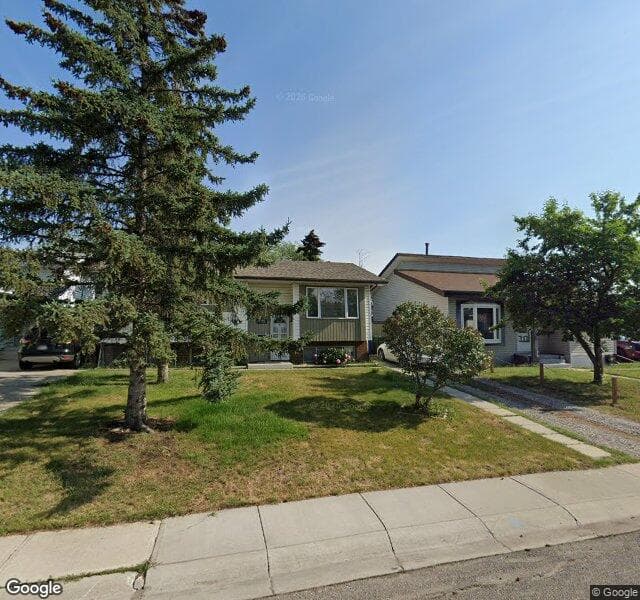 Street view of 112 Pineland Place NE, Calgary
