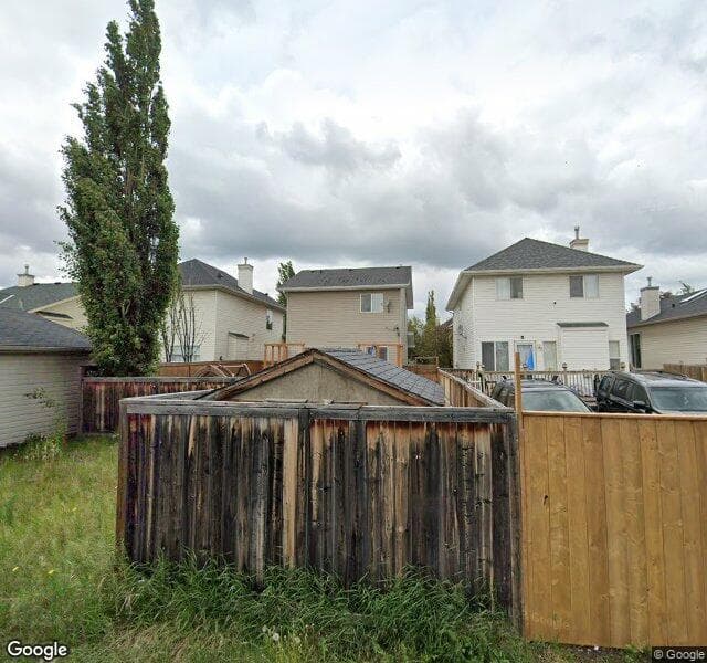 Street view of 68 Bridleridge Gardens SW, Calgary