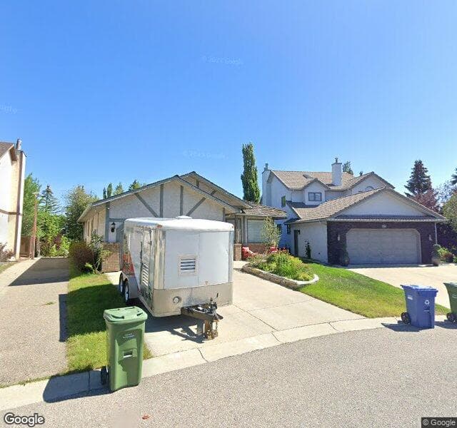 Street view of 20 Strathaven Mews SW, Calgary