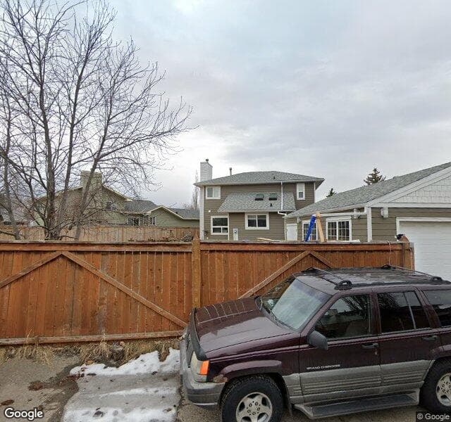 Street view of 119 Riverstone Court SE, Calgary