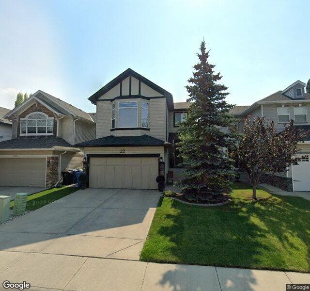 Street view of 22 Cougarstone Park SW, Calgary
