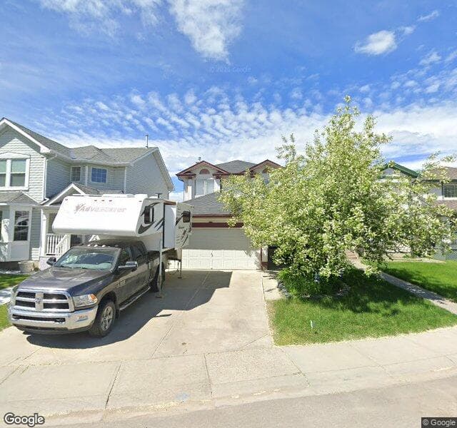 Street view of 355 Mount Apex Green SE, Calgary