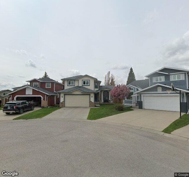 Street view of 48 Sunvista Place SE, Calgary
