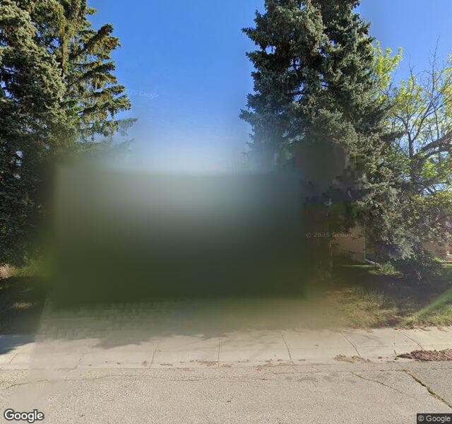 Street view of 1027 Pensdale Crescent SE, Calgary