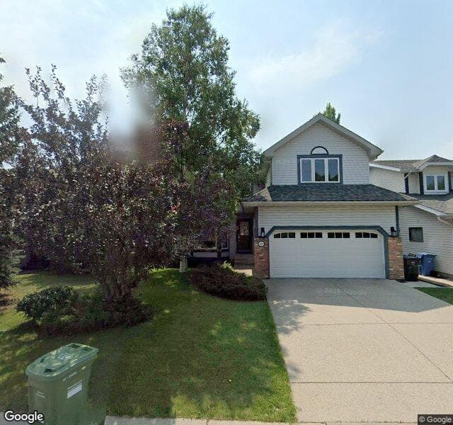 Street view of 180 Woodford Close SW, Calgary