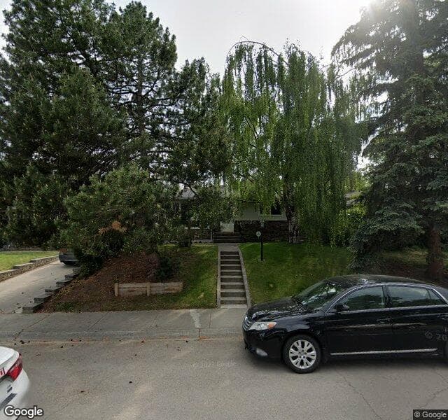 Street view of 83 Woodlark Drive SW, Calgary