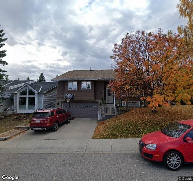 Street view of 128 Straddock Crescent SW, Calgary