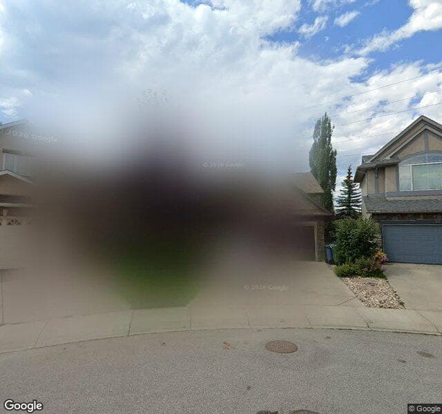 Street view of 66 Strathlea Crescent SW, Calgary