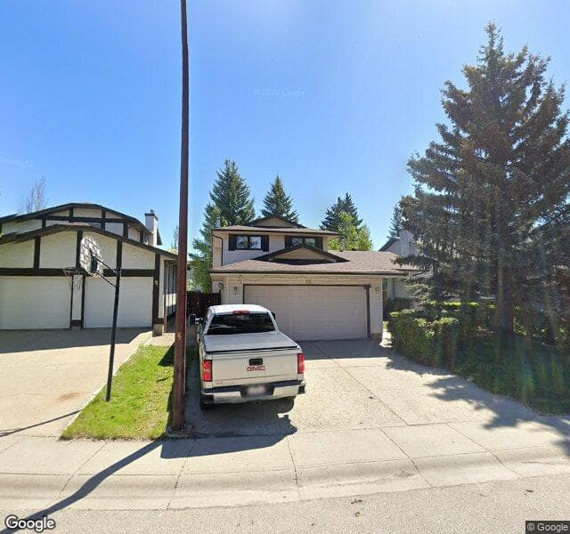 Street view of 60 Woodbrook Close SW, Calgary