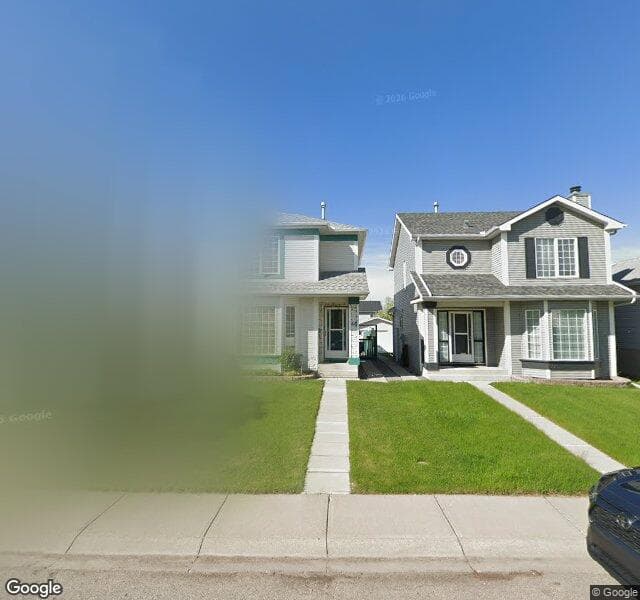 Street view of 46 River Rock Way SE, Calgary