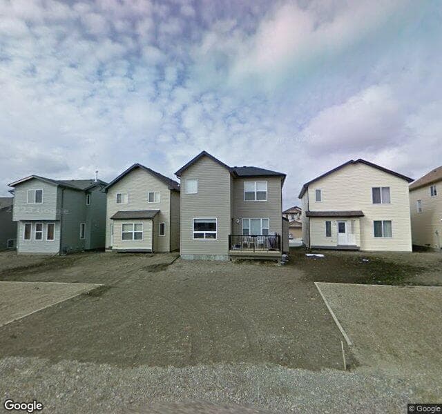Street view of 305 Covecreek Close NE, Calgary
