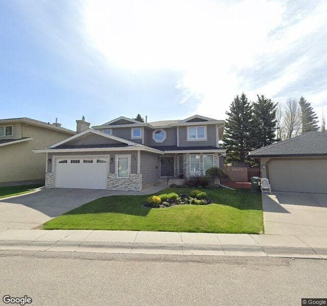 Street view of 83 Sunset Close SE, Calgary